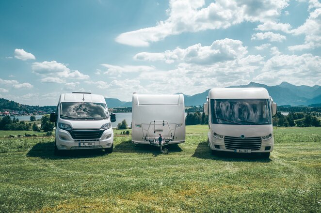 Three motorhomes or campervans parked side by side. | © AL-KO