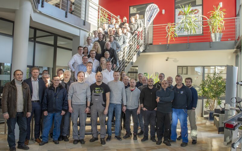 Group photo of the SAWIKO team inside the Customer Center building | © AL-KO Vehicle Technology Group